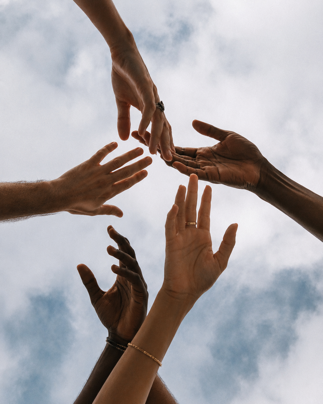 Hands reaching toward each other