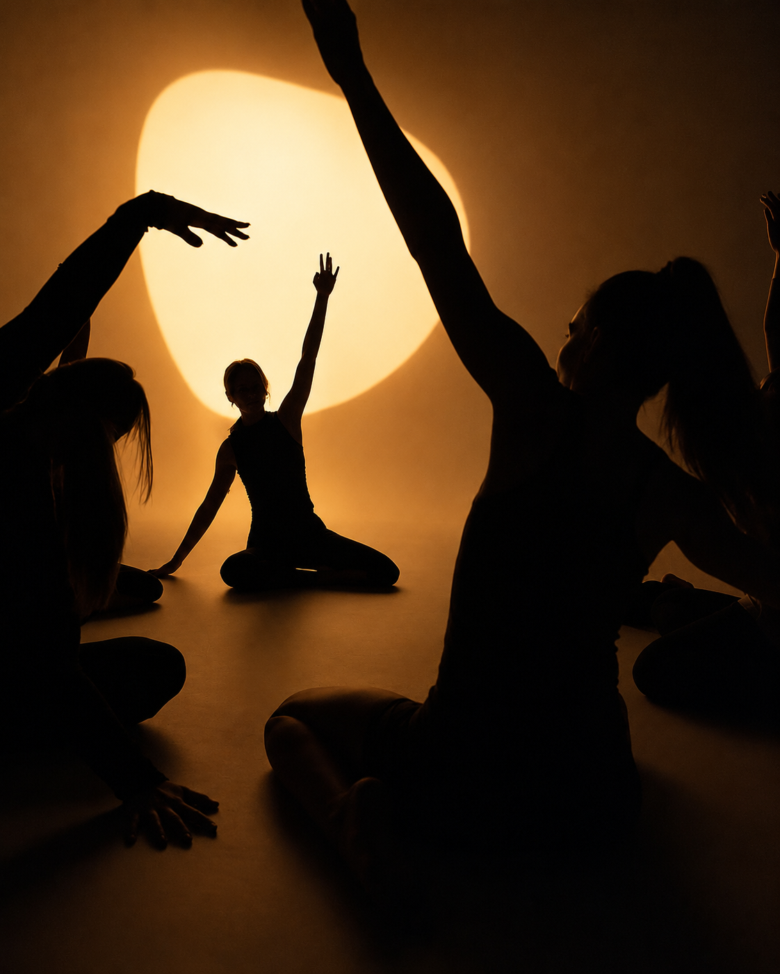 Wellness class moving in warm light